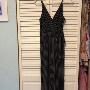 Black and White Striped jumpsuit
Size medium
Never worn
Perfect condition